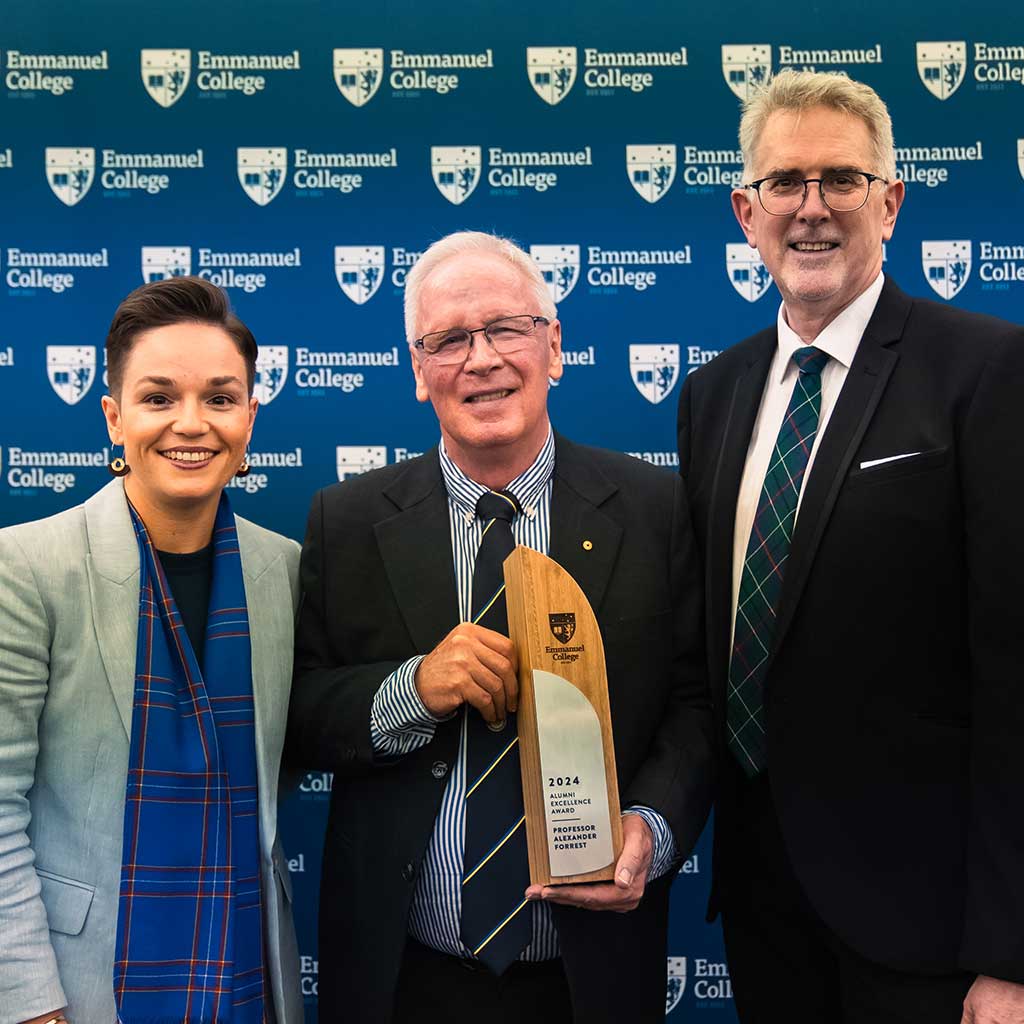Photo of staff presenting the 2024 Alumni Excellence Award at Emmanuel College